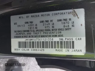 2014 Mazda 3 i Sport with VIN JM1BM1U75E1121358, listed as a IAAI auction lot 42137298 with 163,722 mi miles and . Bid and sale history available at DreamBid. Image 9.