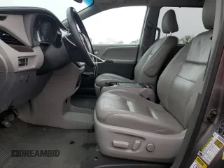 2015 Toyota Sienna XLE with VIN 5TDYK3DC6FS660035, listed as a Copart auction lot 51660075 with 176,968 mi miles and Salvage Title. Bid and sale history available at DreamBid. Image 7.