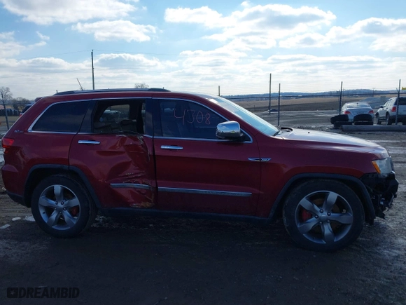 2011 Jeep Grand Cherokee Overland with VIN 1J4RR6GT9BC560482, listed as a IAAI auction lot 41544308 with 111,029 mi miles. Bid and sale history available at carsss.com. Image 13.