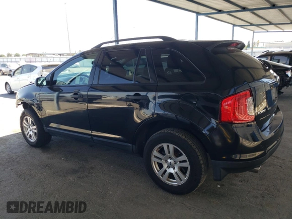 2013 Ford Edge SE with VIN 2FMDK3GC7DBA59317, listed as a Copart auction lot 62963015 with 146,816 mi miles and Salvage title. Bid and sale history available at DreamBid. Image 2.