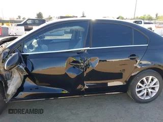 2014 Volkswagen Jetta SE z VIN 3VWD17AJ4EM419839, wystawiony jako IAAI lot #41994141 z przebiegiem 102 068 mil mil oraz . Historia ofert i sprzedaży dostępna na DreamBid. Obrazek 14.