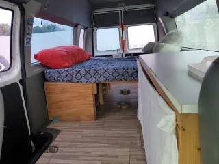 2010 Ford Econoline Passenger XL with VIN 1FBSS3BL2ADA88091, listed as a Copart auction lot 71018604 with 214,293 mi miles and Clean Title. Bid and sale history available at DreamBid. Image 10.