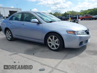 2004 Acura TSX w/Navigation with VIN JH4CL96944C045735, listed as a IAAI auction lot 42042197 with 197,900 mi miles. Bid and sale history available at carsss.com. Image 1.