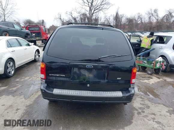 1999 Ford Windstar SE with VIN 2FMDA5243XBC41132, listed as a IAAI auction lot 41575559 with 240,497 mi miles and . Bid and sale history available at carsss.com. Image 16.