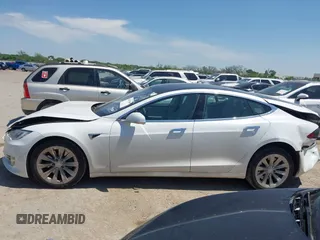 2017 Tesla Model S 100D with VIN 5YJSA1E20HF232570, listed as a IAAI auction lot 42037409 with 68,957 mi miles and . Bid and sale history available at DreamBid. Image 14.