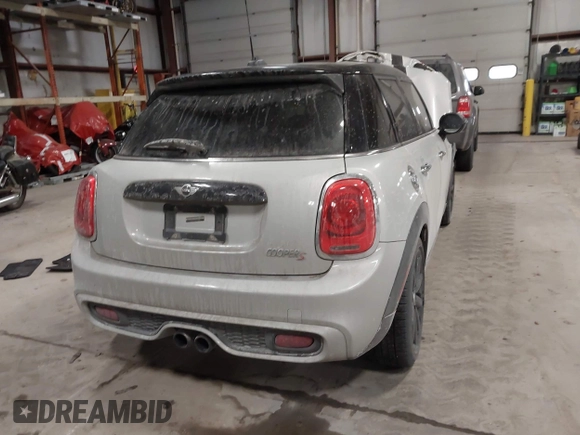 2015 MINI Hardtop 4 Door S with VIN WMWXU3C56F2B66449, listed as a IAAI auction lot 41296784 with 53,589 mi miles and . Bid and sale history available at DreamBid. Image 16.