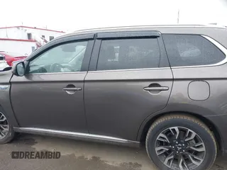 2018 Mitsubishi Outlander SEL with VIN JA4J24A52JZ042127, listed as a IAAI auction lot 42160276 with 106,789 mi miles and . Bid and sale history available at DreamBid. Image 14.
