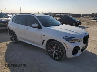 2022 BMW X5 xDrive45e with VIN 5UXTA6C0XN9J37988, listed as a Copart auction lot 47203815 with 27,883 mi miles and Salvage Title. Bid and sale history available at carsss.com. Image 4.