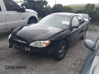 2003 Ford Taurus SES Standard with VIN 1FAFP55223A152802, listed as a IAAI auction lot 42390857 with 141,673 mi miles and . Bid and sale history available at DreamBid. Image 2.
