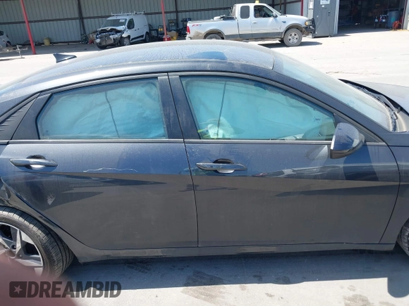 2023 Hyundai Elantra SEL z VIN 5NPLS4AG7PH111202, wystawiony jako IAAI lot #42014119 z przebiegiem 77 356 mil mil oraz . Historia ofert i sprzedaży dostępna na DreamBid. Obrazek 13.