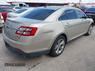 2017 Ford Taurus SEL with VIN 1FAHP2E80HG114307, listed as a IAAI auction lot 42111770 with 157,551 mi miles and . Bid and sale history available at carsss.com. Image 4.