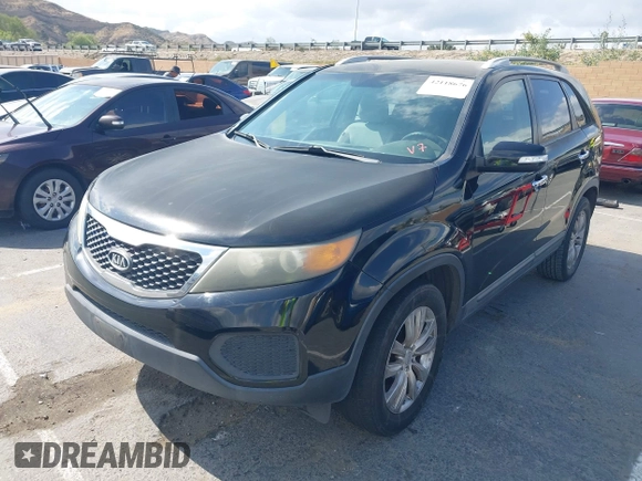2011 Kia Sorento LX with VIN 5XYKT4A23BG055143, listed as a IAAI auction lot 42118676 with 174,268 mi miles. Bid and sale history available at carsss.com. Image 2.