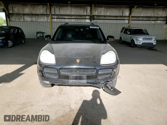 2006 Porsche Cayenne S with VIN WP1AB29P56LA66639, listed as a Copart auction lot 52097595 with 180,827 mi miles and Salvage title. Bid and sale history available at DreamBid. Image 10.