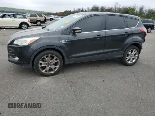 2013 Ford Escape SEL z VIN 1FMCU9H92DUA86916, wystawiony jako Copart lot #63516415 z przebiegiem 167 791 mil mil oraz Szkoda całkowita • Salvage title. Historia ofert i sprzedaży dostępna na DreamBid. Obrazek 1.