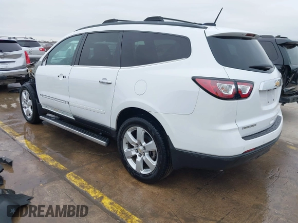 2017 Chevrolet Traverse LT with VIN 1GNKRGKD4HJ324251, listed as a IAAI auction lot 41417741 with 216,641 mi miles and . Bid and sale history available at DreamBid. Image 3.