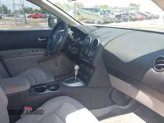 2013 Nissan Rogue S with VIN JN8AS5MT2DW009340, listed as a IAAI auction lot 41939432 with 131,002 mi miles. Bid and sale history available at carsss.com. Image 5.