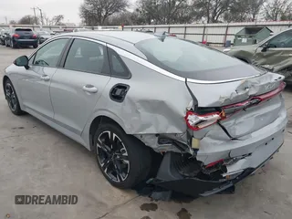 2024 Kia K5 GT-Line z VIN 5XXG64J29RG237148, wystawiony jako IAAI lot #41396574 z przebiegiem 22 926 mil mil oraz . Historia ofert i sprzedaży dostępna na DreamBid. Obrazek 3.