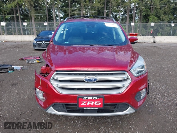 2018 Ford Escape Titanium with VIN 1FMCU9J99JUB44963, listed as a IAAI auction lot 42293113 with 68,803 mi miles and . Bid and sale history available at DreamBid. Image 13.