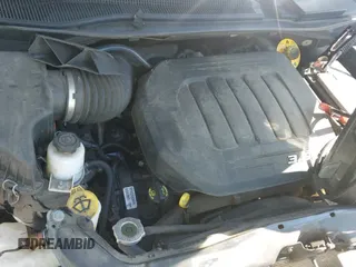 2019 Dodge Grand Caravan SE z VIN 2C4RDGBG3KR531295, wystawiony jako IAAI lot #42443507 z przebiegiem 96 102 mil mil oraz . Historia ofert i sprzedaży dostępna na DreamBid. Obrazek 18.