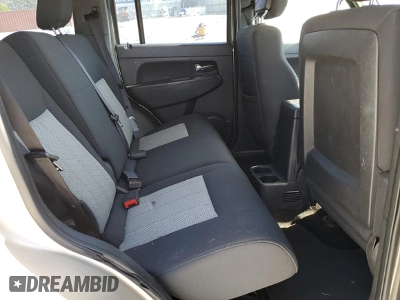 2010 Jeep Liberty Sport with VIN 1J4PP2GK9AW128825, listed as a Copart auction lot 48113835 with 258,730 mi miles and Salvage Title. Bid and sale history available at DreamBid. Image 11.