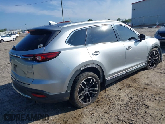 2016 Mazda CX-9 Signature with VIN JM3TCBEY7G0120023, listed as a IAAI auction lot 42431039 with 160,276 mi miles and . Bid and sale history available at DreamBid. Image 4.