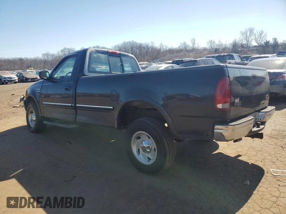 1998 Ford F-150 with VIN 1FTRF18L7WNA73159, listed as a Copart auction lot 48682685 with 71,261 mi miles and Salvage title. Bid and sale history available at DreamBid. Image 2.