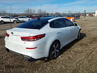 2019 Kia Optima LX with VIN 5XXGT4L31KG334865, listed as a IAAI auction lot 41044256 with 54,717 mi miles. Bid and sale history available at carsss.com. Image 4.