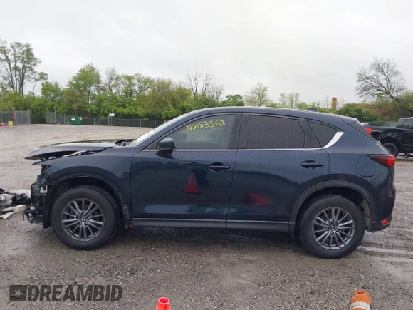 2017 Mazda CX-5 Touring z VIN JM3KFBCL4H0156571, wystawiony jako IAAI lot #42183562 z przebiegiem 135 595 mil mil oraz . Historia ofert i sprzedaży dostępna na DreamBid. Obrazek 15.