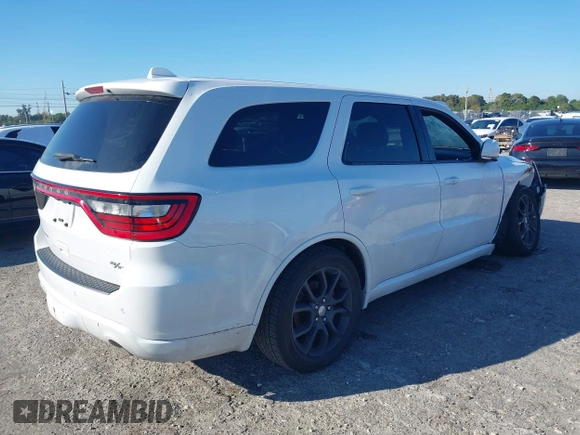 2015 Dodge Durango R/T with VIN 1C4SDHCTXFC938001, listed as a IAAI auction lot 41662269 with 201,918 mi miles and . Bid and sale history available at DreamBid. Image 4.