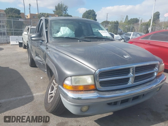 2003 Dodge Dakota SLT with VIN 1D7HL48N23S247441, listed as a IAAI auction lot 41359296 with 58,414 mi miles. Bid and sale history available at carsss.com. Image 1.