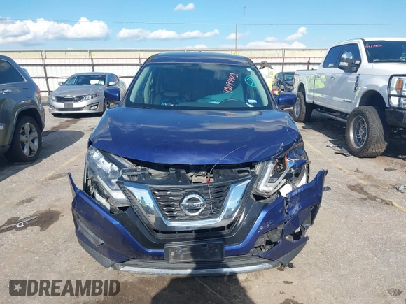 2017 Nissan Rogue SV with VIN JN8AT2MT1HW130104, listed as a IAAI auction lot 42194412 with 98,958 mi miles and . Bid and sale history available at DreamBid. Image 12.