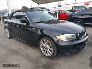 2012 BMW 1 Series 135i with VIN WBAUN7C54CVM26667, listed as a IAAI auction lot 40995340 with 125,489 mi miles. Bid and sale history available at carsss.com. Image 1.
