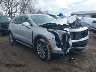 2022 Cadillac XT4 AWD Premium Luxury with VIN 1GYFZDR43NF152561, listed as a IAAI auction lot 41669571 with 16,274 mi miles and . Bid and sale history available at carsss.com. Image 1.