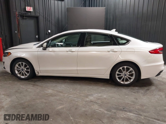2020 Ford Fusion SE z VIN 3FA6P0LU8LR142370, wystawiony jako IAAI lot #42457342 z przebiegiem 53 808 mil mil oraz . Historia ofert i sprzedaży dostępna na DreamBid. Obrazek 14.