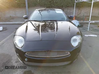2008 Jaguar XK with VIN SAJWA43B985B23987, listed as a IAAI auction lot 41197091 with 54,803 mi miles. Bid and sale history available at carsss.com. Image 12.