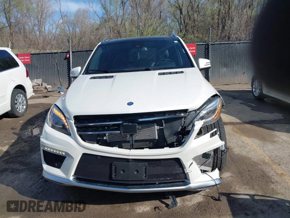 2015 Mercedes-Benz M 63 AMG with VIN 4JGDA7EB6FA471585, listed as a IAAI auction lot 41883006 with 39,243 mi miles and . Bid and sale history available at carsss.com. Image 12.