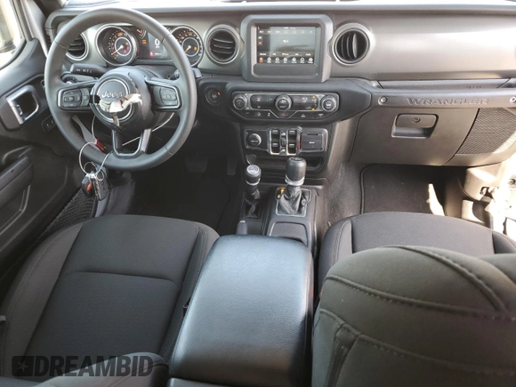 2023 Jeep Wrangler Willys with VIN 1C4HJXDNXPW702199, listed as a Copart auction lot 53815985 with 24,943 mi miles and Clean Title. Bid and sale history available at DreamBid. Image 8.