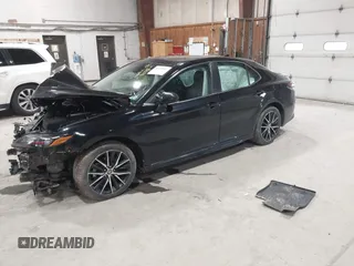 2021 Toyota Camry SE Nightshade with VIN 4T1T11AK2MU483971, listed as a IAAI auction lot 41934957 with 61,618 mi miles and . Bid and sale history available at DreamBid. Image 2.