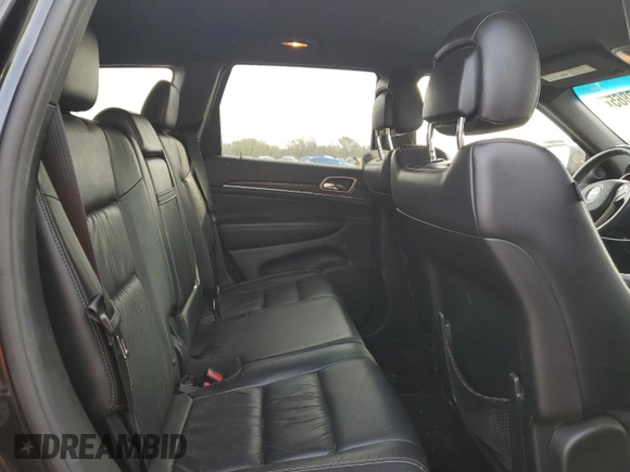 2014 Jeep Grand Cherokee Limited z VIN 1C4RJFBG5EC446829, wystawiony jako Copart lot #51072865 z przebiegiem 114 590 mil mil oraz Szkoda całkowita • Salvage title. Historia ofert i sprzedaży dostępna na DreamBid. Obrazek 11.