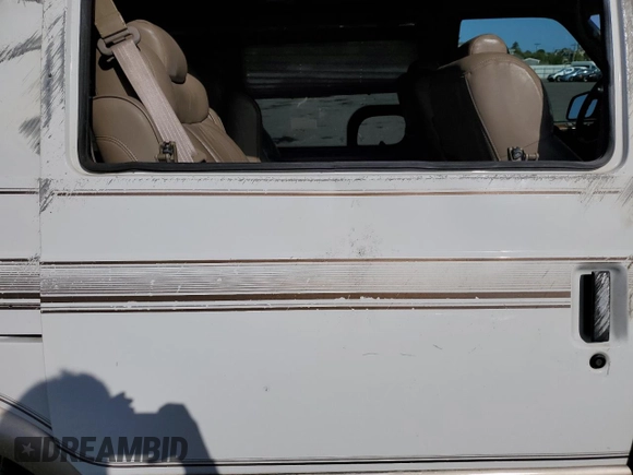 2000 Chevrolet Astro Cargo YF7 z VIN 1GBDM19W1YB211571, wystawiony jako Copart lot #52156885 z przebiegiem 211 508 mil mil oraz Nie do naprawy • Non repairable. Historia ofert i sprzedaży dostępna na DreamBid. Obrazek 11.