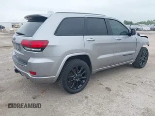 2019 Jeep Grand Cherokee Laredo E with VIN 1C4RJFAG9KC670974, listed as a IAAI auction lot 42333028 with 163,958 mi miles and . Bid and sale history available at DreamBid. Image 4.