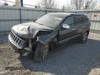 2014 Jeep Grand Cherokee Overland with VIN 1C4RJFCG4EC172361, listed as a Copart auction lot 49053155 with 144,916 mi miles and Salvage Title. Bid and sale history available at DreamBid. Image 1.