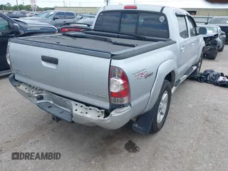 2009 Toyota Tacoma with VIN 3TMLU42N69M032320, listed as a IAAI auction lot 42280196 with 214,720 mi miles and . Bid and sale history available at DreamBid. Image 4.