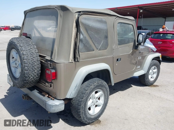 2003 Jeep Wrangler X with VIN 1J4FA39S03P312550, listed as a IAAI auction lot 41837150 with 127,239 mi miles and . Bid and sale history available at DreamBid. Image 4.