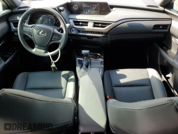 2021 Lexus UX 250h with VIN JTHX9JBH2M2049657, listed as a Copart auction lot 58744945 with 36,054 mi miles and Salvage title. Bid and sale history available at DreamBid. Image 8.