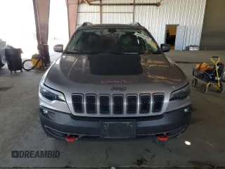 2019 Jeep Cherokee Trailhawk с VIN 1C4PJMBX0KD362032, выставлен на аукционе Copart как лот 61495195 с пробегом 49 028 миль миль и Списание • Salvage title. История ставок и продаж доступна на DreamBid. Изображение 5.