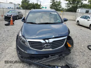 2012 Kia Sportage LX z VIN KNDPBCA27C7234285, wystawiony jako Copart lot #65807995 z przebiegiem 178 515 mil mil oraz Czysty tytuł • Clean title. Historia ofert i sprzedaży dostępna na DreamBid. Obrazek 5.