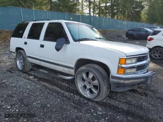 1997 Chevrolet Tahoe with VIN 1GNEK13R8VJ372825, listed as a Copart auction lot 47395435 with 211,491 mi miles and Salvage Title. Bid and sale history available at carsss.com. Image 4.