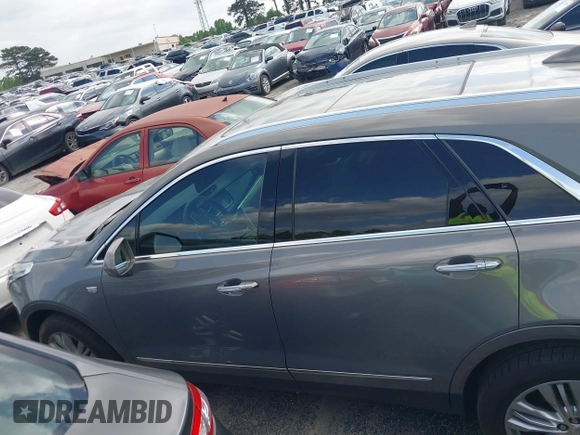 2017 Cadillac XT5 Premium Luxury FWD with VIN 1GYKNCRS4HZ304367, listed as a IAAI auction lot 42086993 with 162,273 mi miles and . Bid and sale history available at DreamBid. Image 14.
