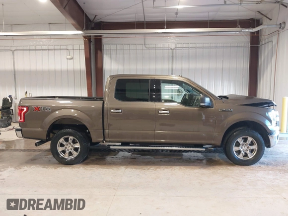 2015 Ford F-150 XLT with VIN 1FTEW1EFXFFB14990, listed as a IAAI auction lot 41681520 with 121,255 mi miles. Bid and sale history available at carsss.com. Image 14.